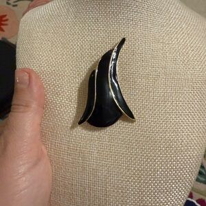 Elegant Black and Gold Brooch